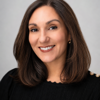 Headshot of CEO Kara Capone